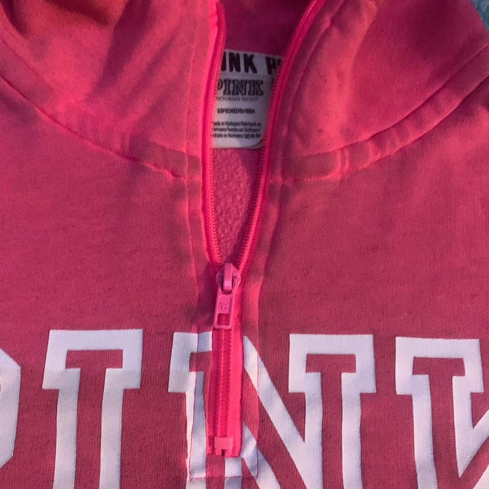 Victoria’s Secret pink sweater.